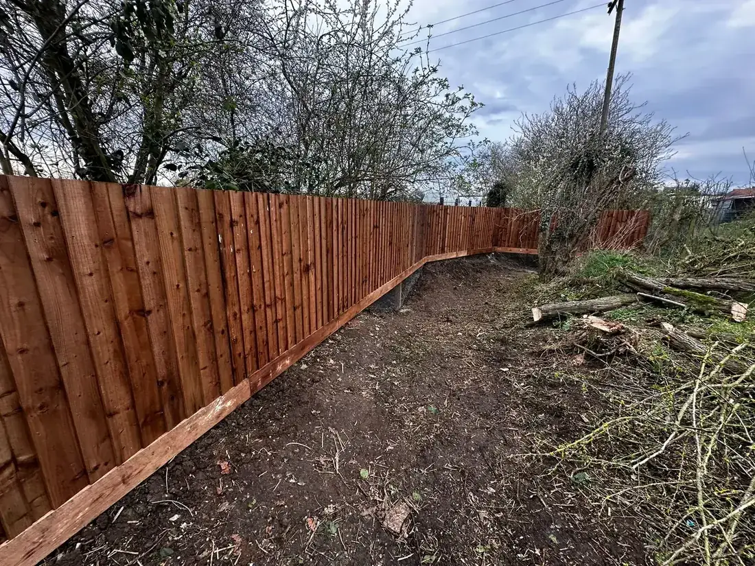 Close-board fencing continuing along the same garden boundary